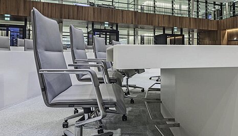 Sola chairs in modern assembly hall, side view seating row